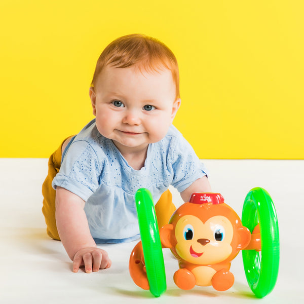 Bright Starts rollender und beleuchteter Affe